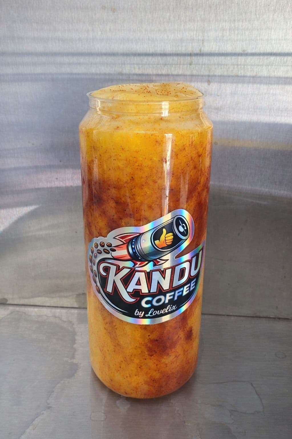 Mangonada — mango puree, chamoy, and tajin in a Kandu can